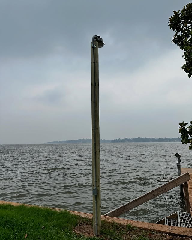 Outdoor electrical lighting installed beside the water by E.S.H. Electric.