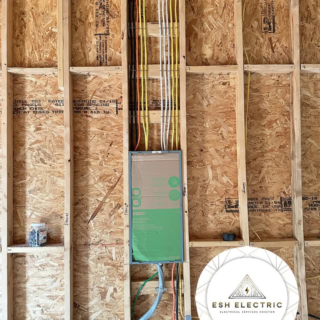E.S.H. Electric residential 200 amp panel installation in framed construction.